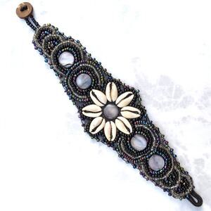Beaded shell accent leather cuff bracelet, flower design